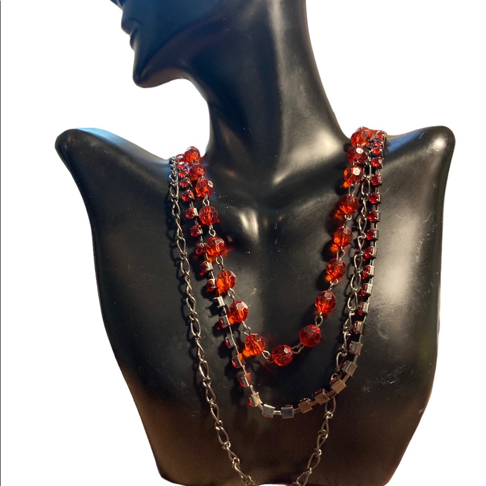 Three stranded beaded silver necklace